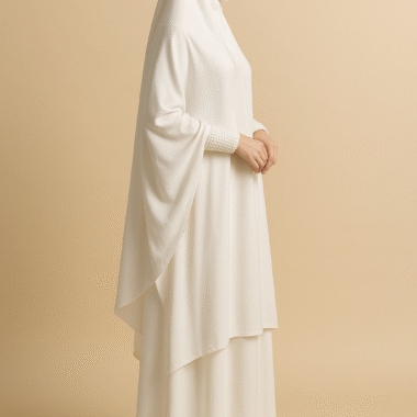 Side view of modest white prayer jilbab displayed on mannequin